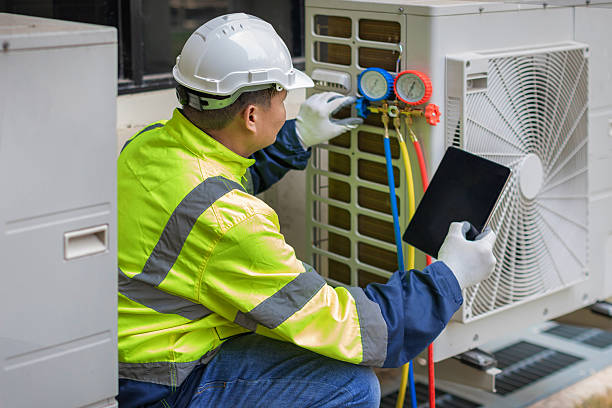 Professional Hvac technician working in Old Bethpage, NY